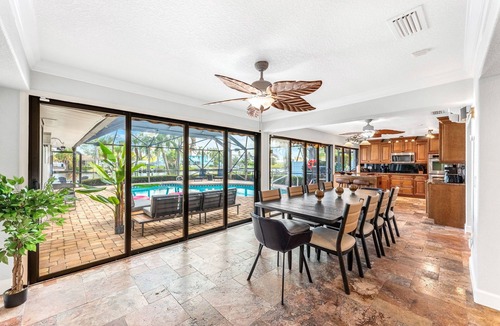 Cocoa Isles House | CanalFront | Heated Pool + Game Room w/Pool Table