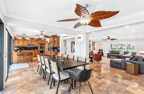 Cocoa Isles House | CanalFront | Heated Pool + Game Room w/Pool Table