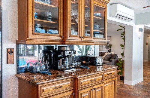 Cocoa Isles House | CanalFront | Heated Pool + Game Room w/Pool Table