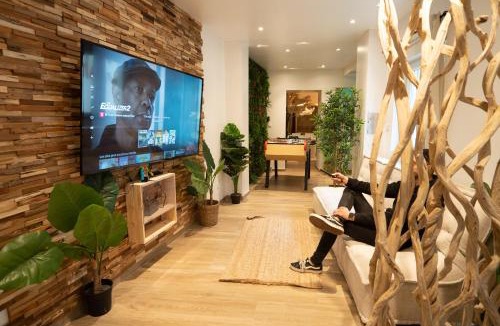 Trith-Saint-Leger Apartment | Capsule Thailande I Sauna I Balnéo I Console I jeux en bois I Cinéma I cour intérieure