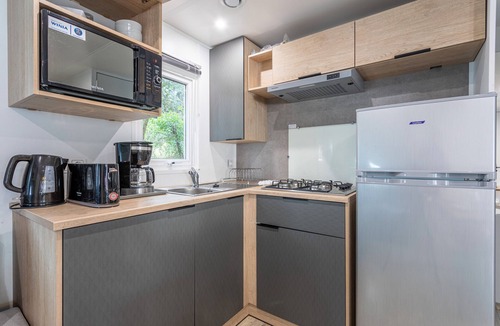 Les Conches RV Rental | Caravan '150' with Shared Pool and Shared Terrace