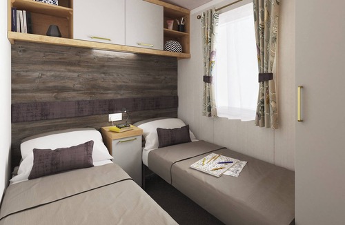 Waren Mill House | Caravan with one double and one twin.