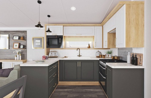 Waren Mill House | Caravan with one double and two twin.