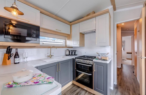 Waren Mill House | Caravan with one double and two twin.