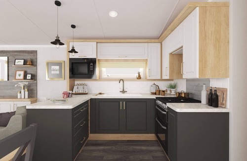 Waren Mill House | Caravan with one double and two twin.