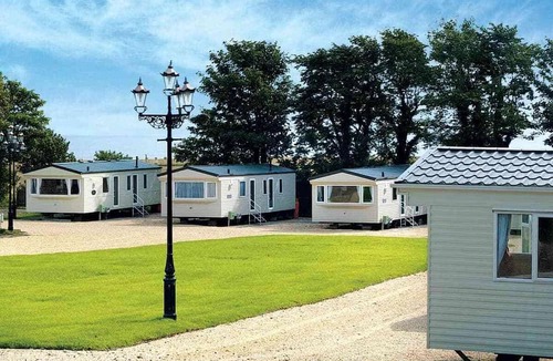 Saint Cyrus House | Caravan with one double and two twin.