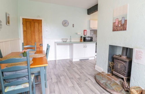Llysfaen Cottage | CARTREF MELUS, pet friendly, with open fire in Old Colwyn