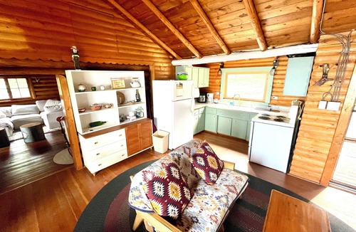 Eagle River Cabin | Casa de Campo, a magical log cabin nestled in the woods directly on the lake.