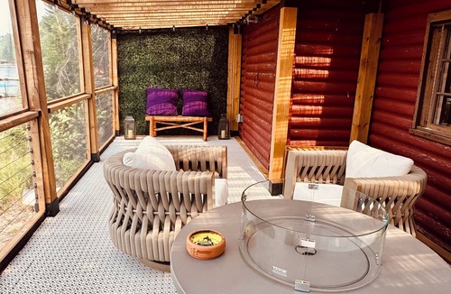Eagle River Cabin | Casa de Campo, a magical log cabin nestled in the woods directly on the lake.