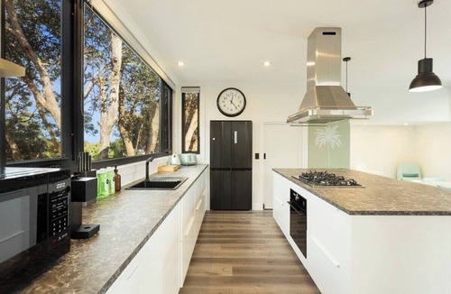 Rhyll House | Casa de Palmeras