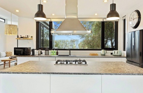 Rhyll House | Casa de Palmeras