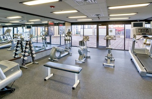 Wheatland Apartment | Casa delsol Suites by OKC Airport. Arcade, Largest Indoor pool, Banquet Hotel