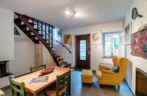 Bissone Apartment | Casa In Contrada by Quokka 360 - Colorful Village House on Lake Lugano