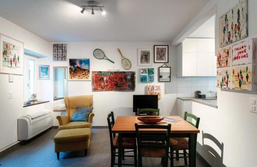 Bissone Apartment | Casa In Contrada by Quokka 360 - Colorful Village House on Lake Lugano