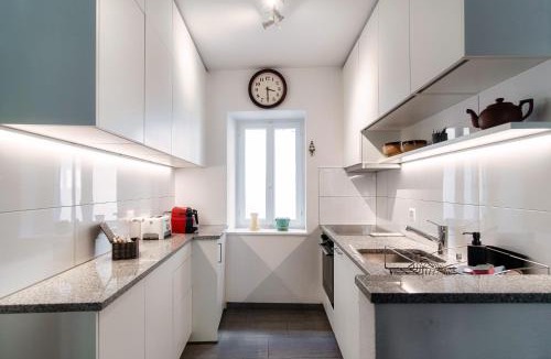 Bissone Apartment | Casa In Contrada by Quokka 360 - Colorful Village House on Lake Lugano