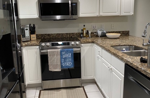 Layton House | Casa Playa 3 Bdrm 3.5 Ba TH, Oceanfront, Pool, Dock, Sandy Beach, Gated.