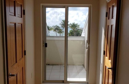 Layton House | Casa Playa 3 Bdrm 3.5 Ba TH, Oceanfront, Pool, Dock, Sandy Beach, Gated.