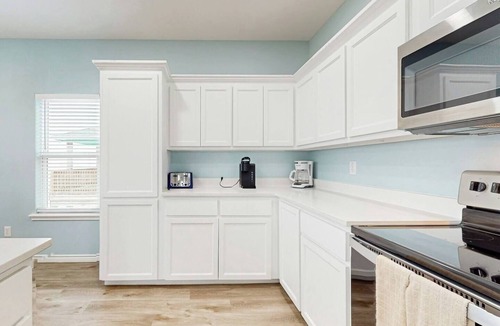 Aransas Pass House | Casa Sol, a spacious 3BR/2BA coastal retreat in Aransas Pass! Featuring 1 king bed, 4 queen beds, a large backyard, covered outdoor space, and room for the boat. Just a short drive to Rockport Beach, Port Aransas, fishing, dining, and coastal fun.