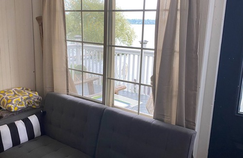 Seneca Falls Cottage | Cayuga Lake Charming Vintage Cottage on the Water with Private Dock