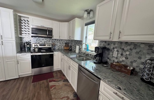 Seneca Falls House | Cayuga Lake Escape! Private Dock on Wine Trail + Fire Pit. Great for Groups.