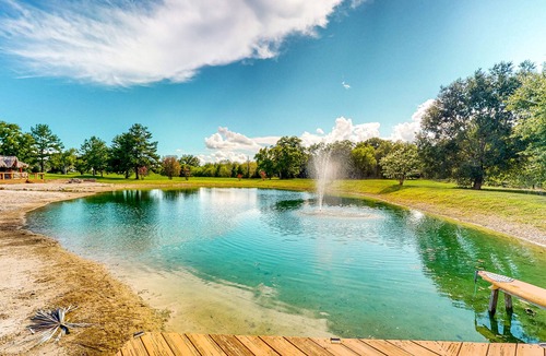 Waller Cabin | Cedar cabin with pretty pond, beach, swimming deck & tropical hut/bar