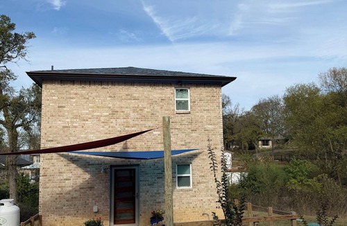 Log Cabin House | Cedar Creek Lake: lake view, dock access and big bass just off shore.