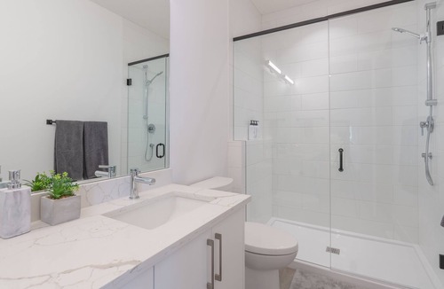 Bridgeland House | Central, Family-sized 3 BR Townhome with AC, Work Space & Private Parking