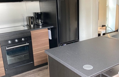Kolding Condo | Central Lejlighed med Egen Have tæt ved Slotssøen