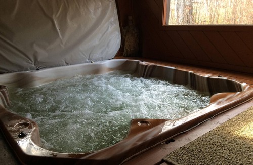 Killington Ski Chalet | Central Ski home with Hot Tub, sauna, walk to restaurants, and ski shops