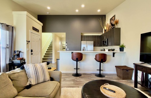 Grand Mound House | Centralia home minutes to NW Sports Hub. Modern two bedroom - primary ensuite. Main level bedroom with full bathroom adjacent. Full kitchen. Fully fenced backyard with covered patio. In home laundry - full size washer/dryer. Parking - 4 cars