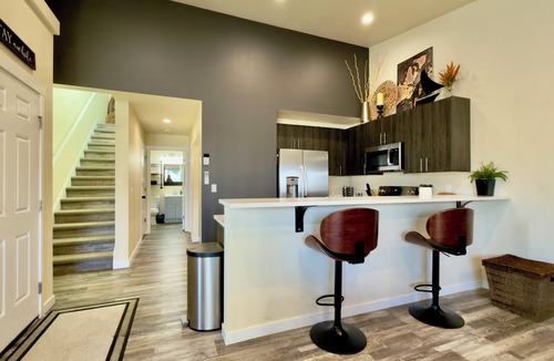 Grand Mound House | Centralia home minutes to NW Sports Hub. Modern two bedroom - primary ensuite. Main level bedroom with full bathroom adjacent. Full kitchen. Fully fenced backyard with covered patio. In home laundry - full size washer/dryer. Parking - 4 cars