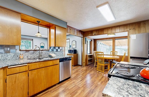 Rockaway Beach House | Centrally located home with lake views, private pool & spacious deck