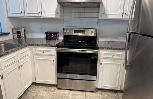 Woodcroft Apartment | centrally located 2 master suite main level stylish condo