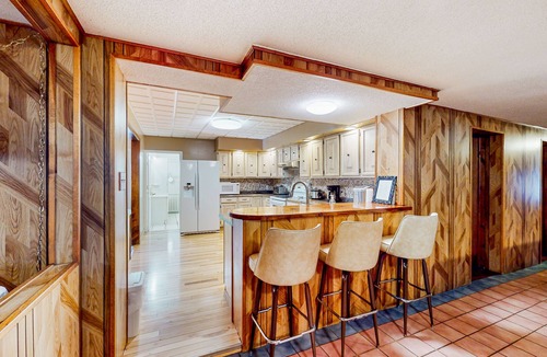 Madawaska House | Centrally located home near snowmobile trails with hot tub, sauna, & pool table