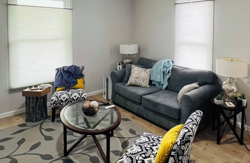 East Durham House | Centrally located + King Bd + 2 full ba + 75" TV + private parking.