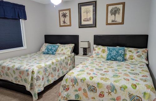 Surfside Beach Apartment | Centrally Located-Well Equipped Kitchen-Forest Views-Pools