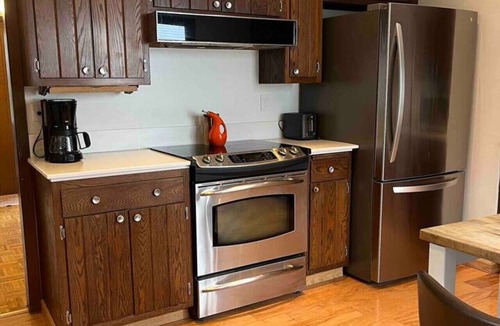 Des Moines House | Centrally Located Wooded A-Frame