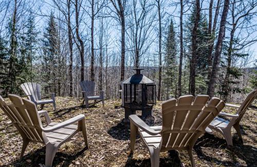 Mandeville Ski Chalet | Chalet bois rond avec spa, foyer et nature privée