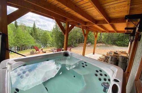 Mauricie Ski Chalet | Chalet bois rond aux paysages uniques avec spa!
