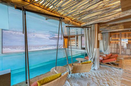 Courchevel Ski Chalet | Chalet de luxe à Courchevel avec piscine et personnel 15 pers - FR-1-562-71