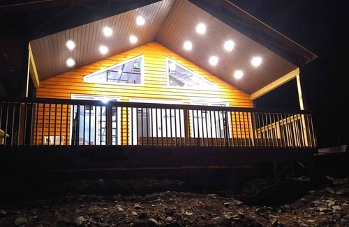 Queens House | Chalet directly on the lake, central storage, incl. access to private island