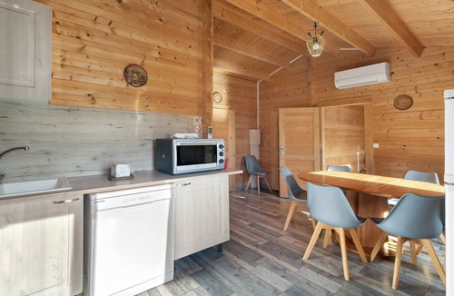 Saint-Martial-de-Nabirat RV Rental | “Chalet” with Shared Pool, Wi-Fi, and Air Conditioning