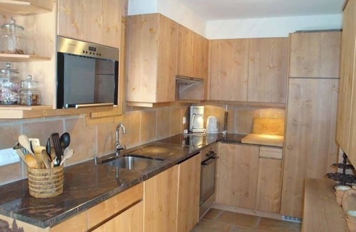 Grimentz Ski Chalet | Chalet high standing close to the slopes for 12 persons : 1. floor : living-room with wood stove - k