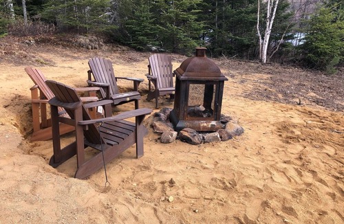 Mandeville Ski Chalet | Chalet l'Oasis with private lakeside beach and in-ground spa