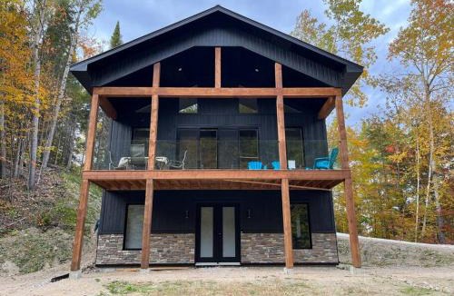 Mont Ste. Marie Ski Chalet | Chalet Relax with sauna steps from MSM lodge