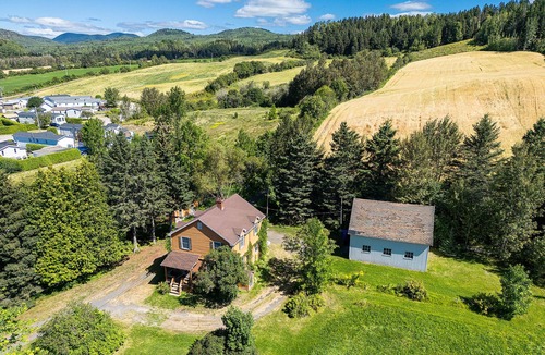 Clermont Condo | Chalet with character in a forest environment