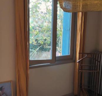 Guilhemery House | Chambre côté jardin dans maison Art Déco Toulouse