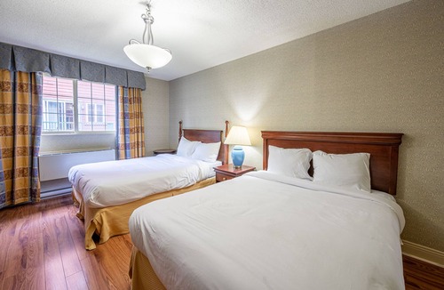 Saint-Sauveur Hotel | Chambre d'hotel le Cadillac 2 lits queen