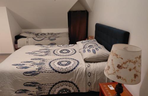Baule House | Chambre sous les toits