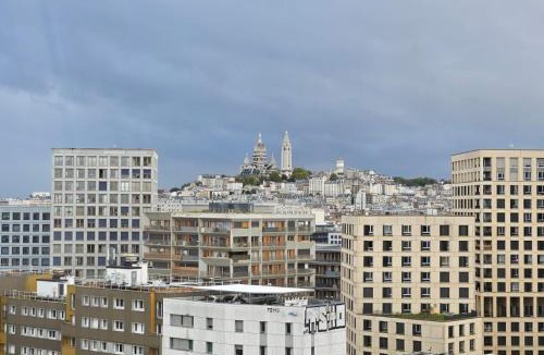 Porte de la Chapelle House | Chambres lumineuses avec vue sur Paris Montmartre